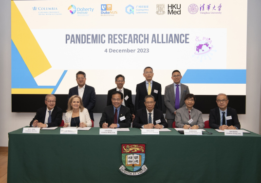 Leading global scientists from six leading institutions in four countries launched the Pandemic Research Alliance (PRA) to drive concerted research into respiratory viruses from animals to humans, improved surveillance, and new solutions to better manage the next pandemic. Joining the signing ceremony were: (front row, from left) Professor David Ho from Columbia University Irving Medical Center; Professor Sharon Lewin, Doherty Institute – University of Melbourne; Professor Wang Linfa, Duke-NUS Medical School; Professor Zhong Nanshan, Guangzhou National Laboratory; Professor Yuen Kwok-Yung, the University of Hong Kong (HKU); and Professor Zhang Linqi, Tsinghua University; witnessed by (back row, from left) Professor Roger Wu, Columbia University Irving Medical Center; Professor Chen Xinwen, Deputy Director, Guangzhou National Laboratory; Professor Chak-sing Lau, Dean of Medicine, HKU; and Mr Sim Zhimin, Director (International Partnerships and Strategy), Tsinghua Medicine, Tsinghua University.
 